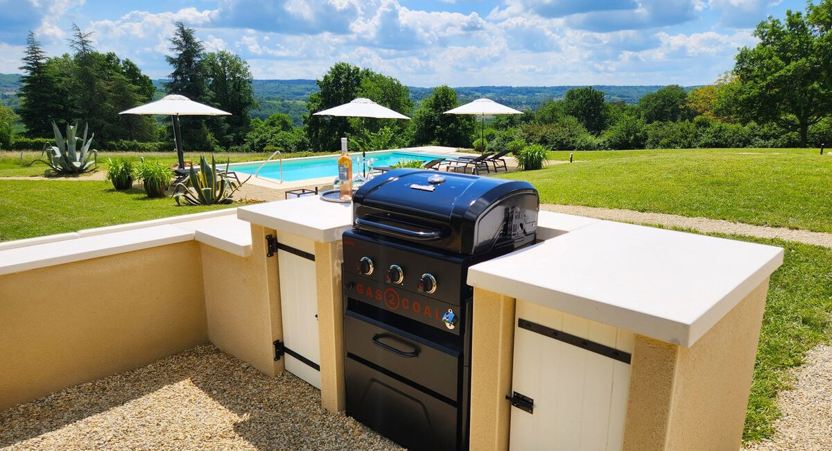 BBQ lounge area with panoramic Dordogne views