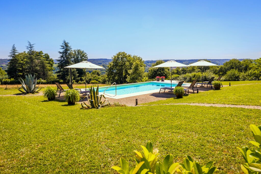Private pool with sunbeds and countryside view