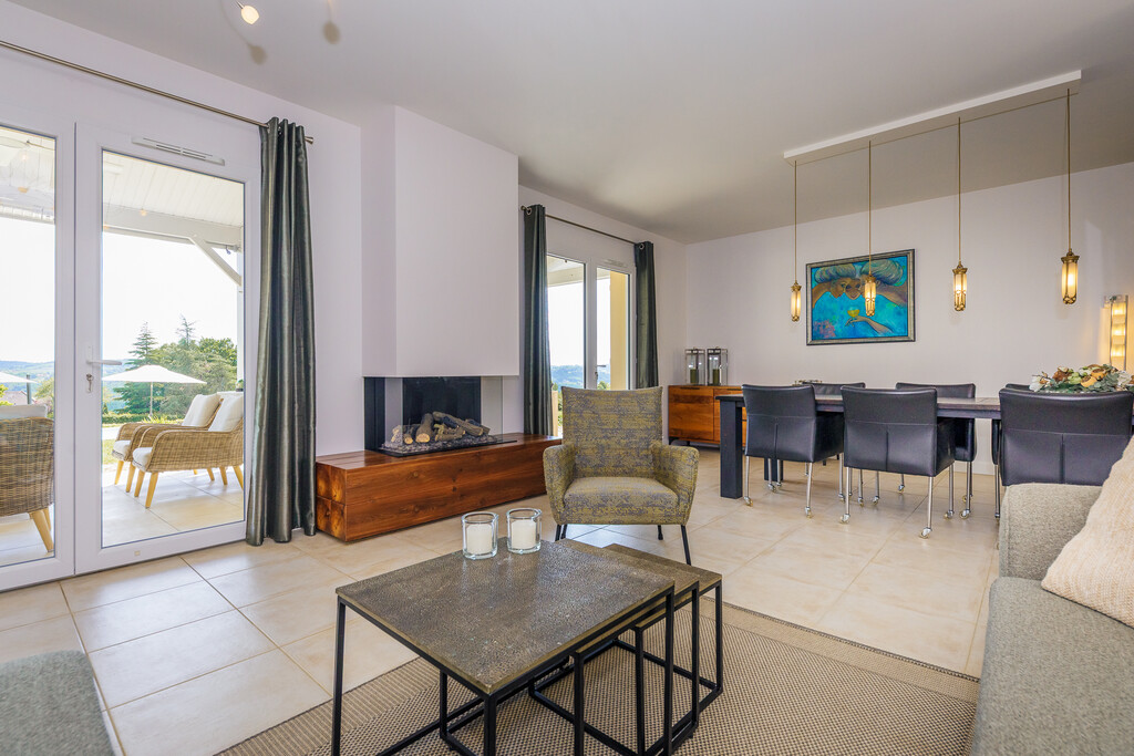 Open-plan living and dining area with elegant interior design