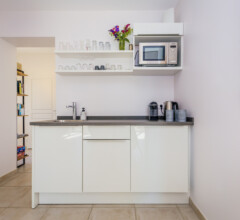 Additional kitchenette next to the bedrooms for extra convenience