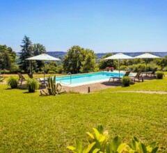 Private pool with sunbeds and countryside view