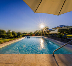 Evening light reflecting on the villa’s private swimming pool